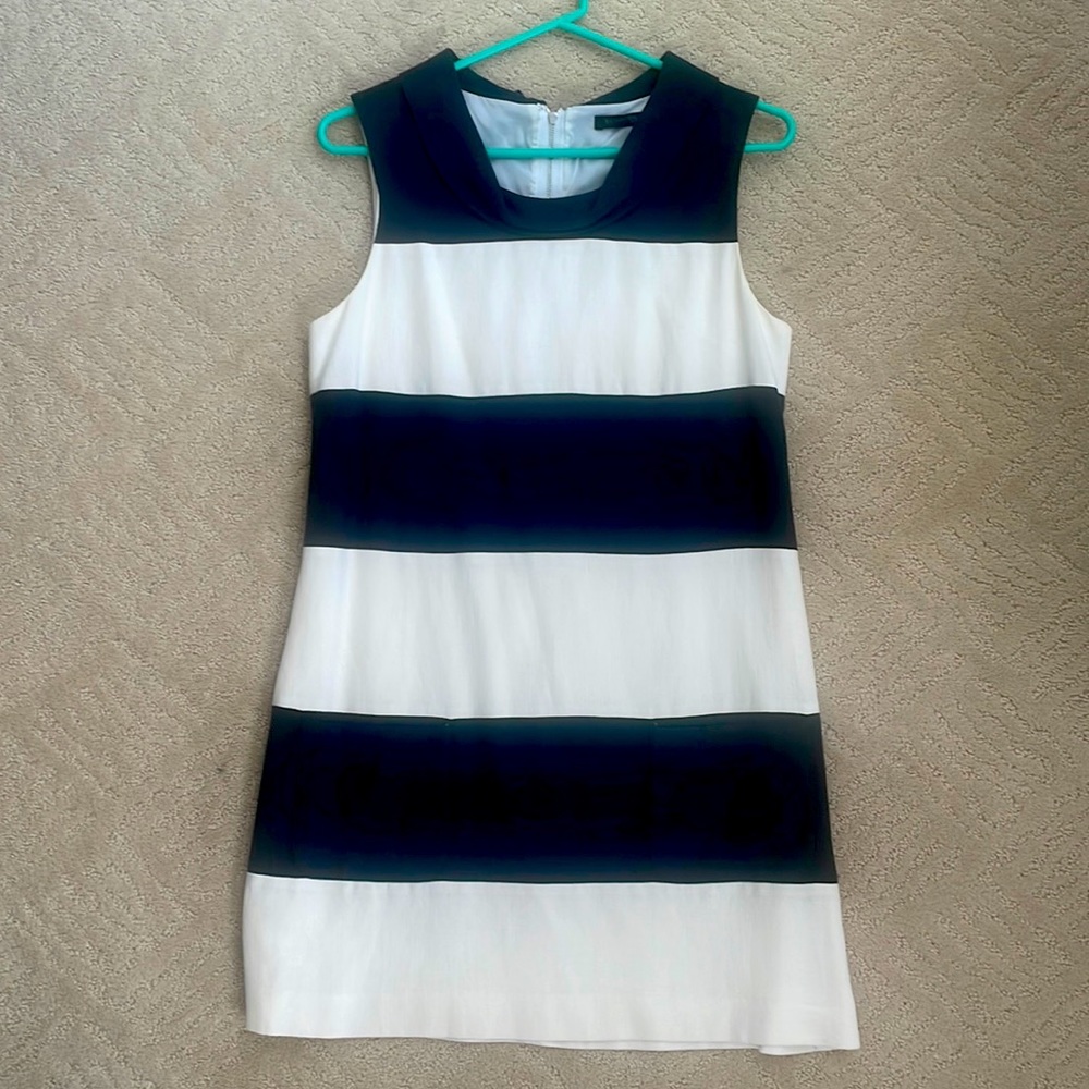 Sheath dress with pockets.